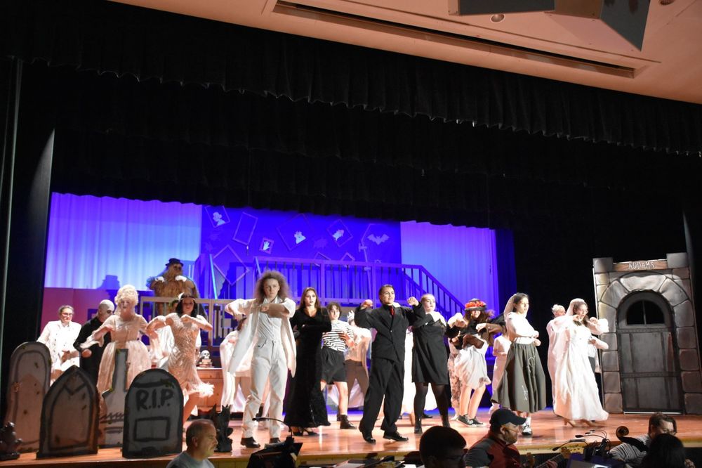 Dancing cast of the Addams Family 