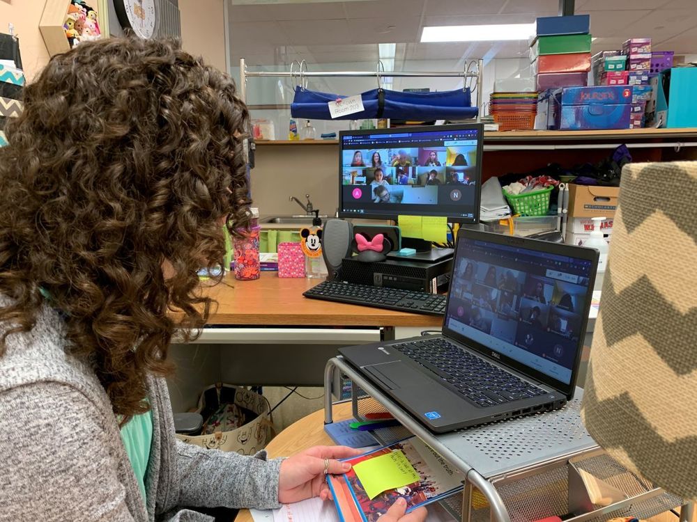 RCS teacher Ms. McKown working with students remotely.